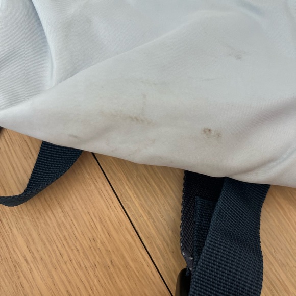 Light blue and navy champion backpack with little stain on the bottom - Picture 3 of 8